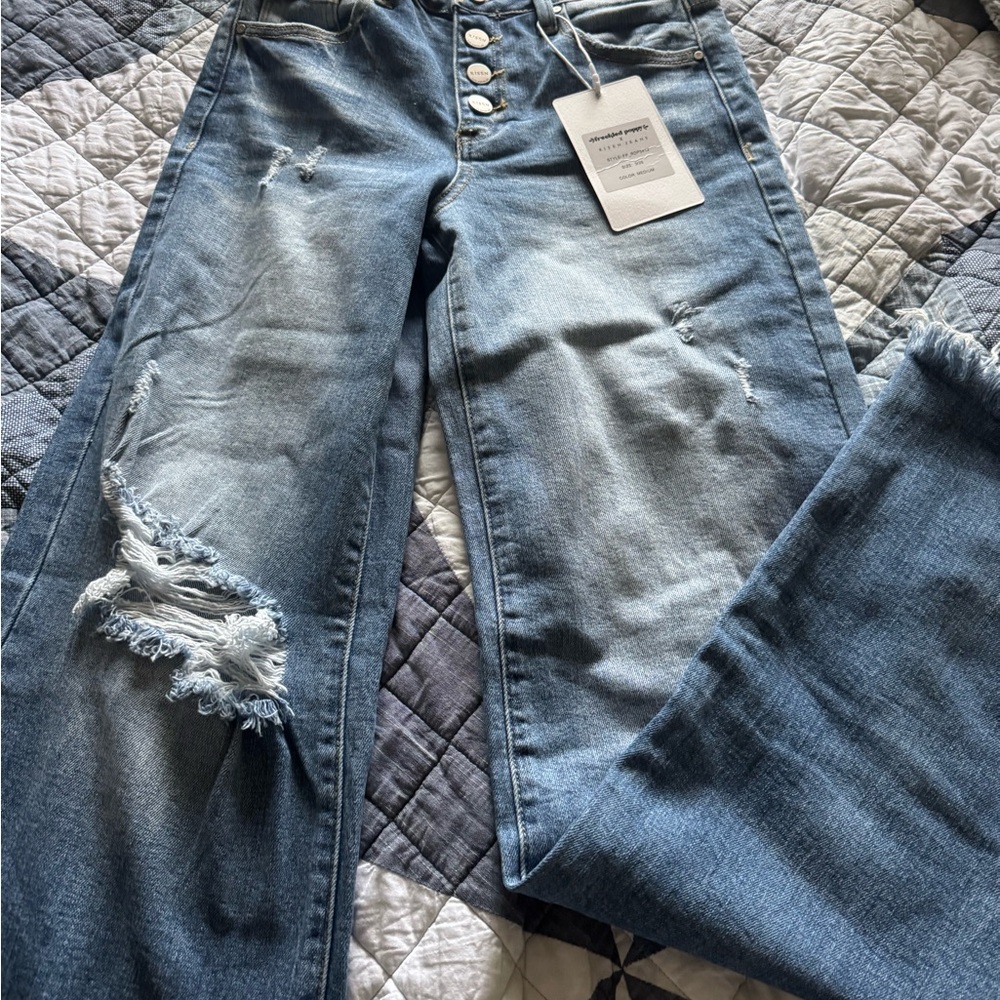 Women's Distressed Blue Jeans